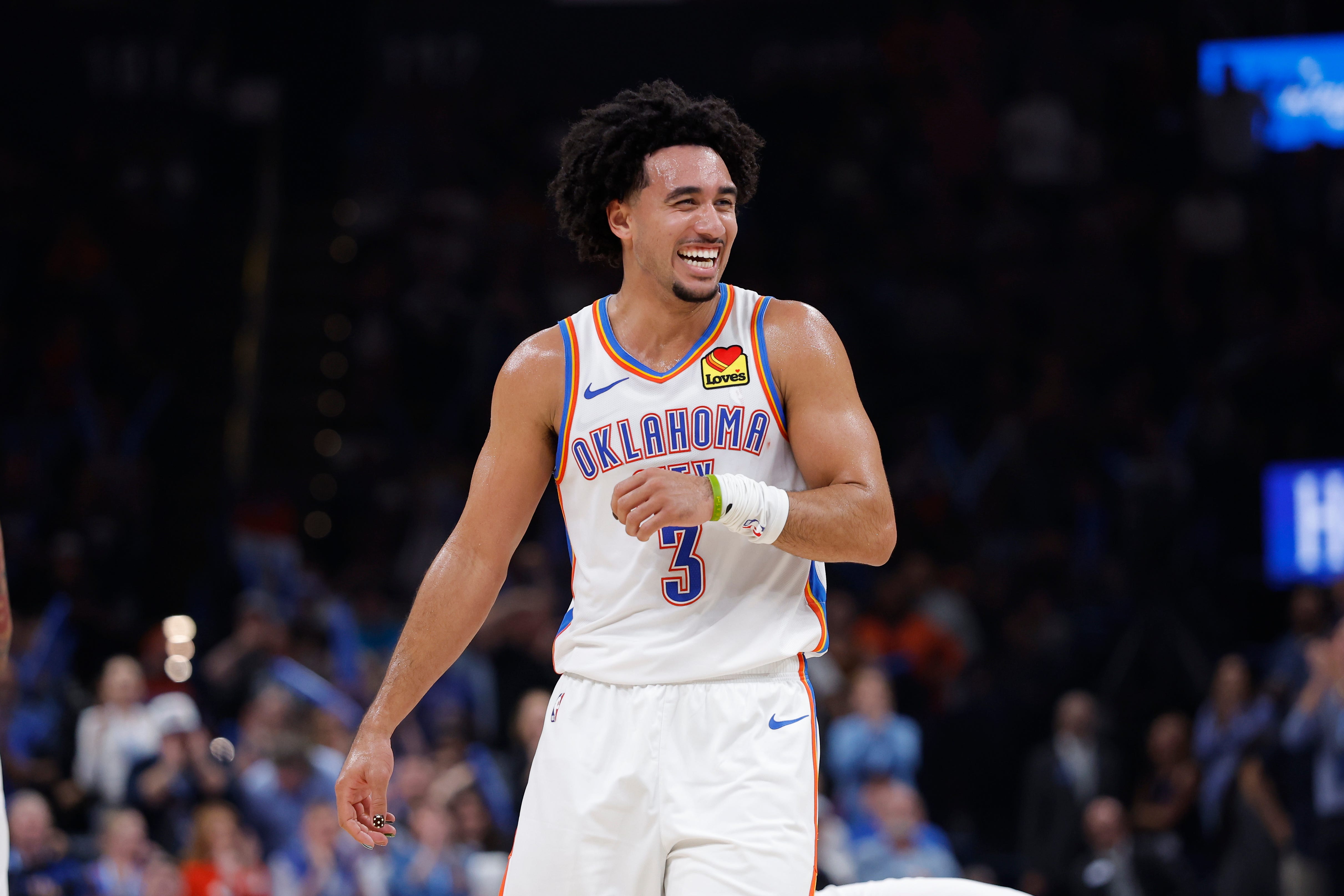 Oct 26, 2026; Oklahoma City, Oklahoma, USA; Oklahoma City Thunder guard Jared McCain (3) laughs after a play against the Phoenix Suns during the second half at Paycom Center. Mandatory Credit: Alonzo Adams-Imagn Images
