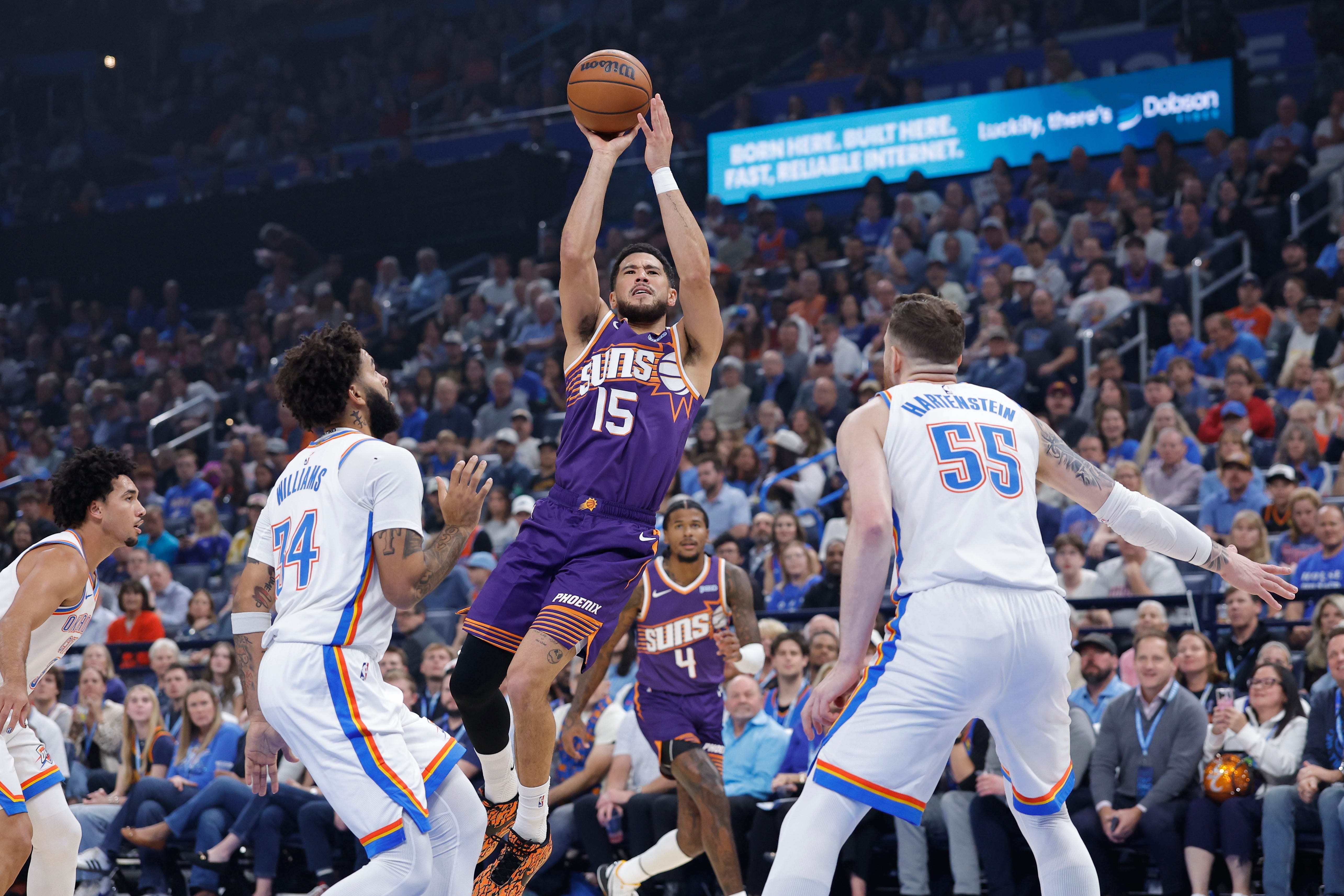 Oct 26, 2026; Oklahoma City, Oklahoma, USA; Phoenix Suns guard Devin Booker (15) shoots against the Oklahoma City Thunder during the first half at Paycom Center. Mandatory Credit: Alonzo Adams-Imagn Images