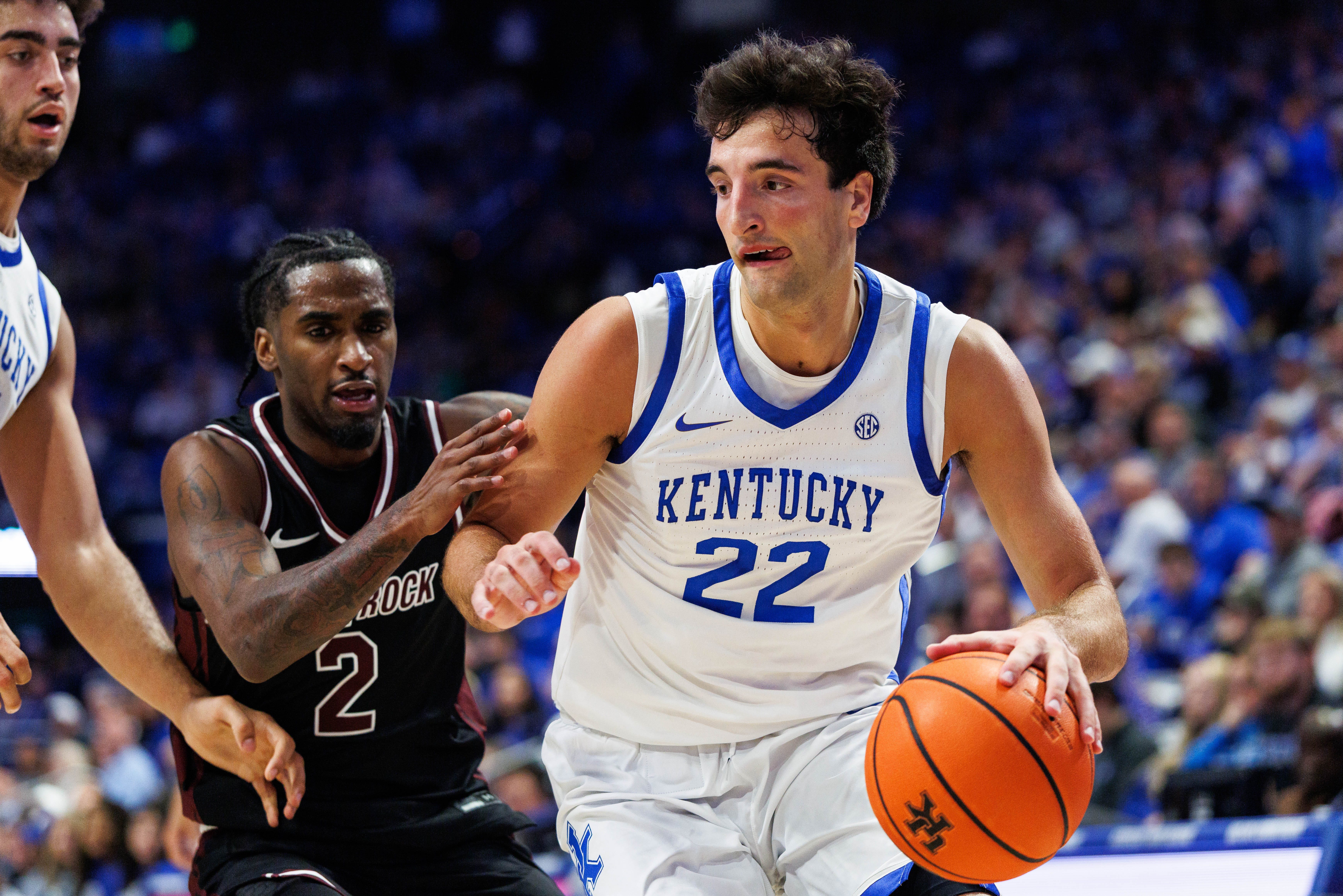 Oct 16, 2026; Lexington, KY, USA;  Kentucky Wildcats forward Milan Momcilovic (22) drives to the basket against Little Rock Trojans guard Jah'Likai King (2) during the second half at Rupp Arena Central Bank Center.  Mandatory Credit: Jordan Prather-Imagn Images