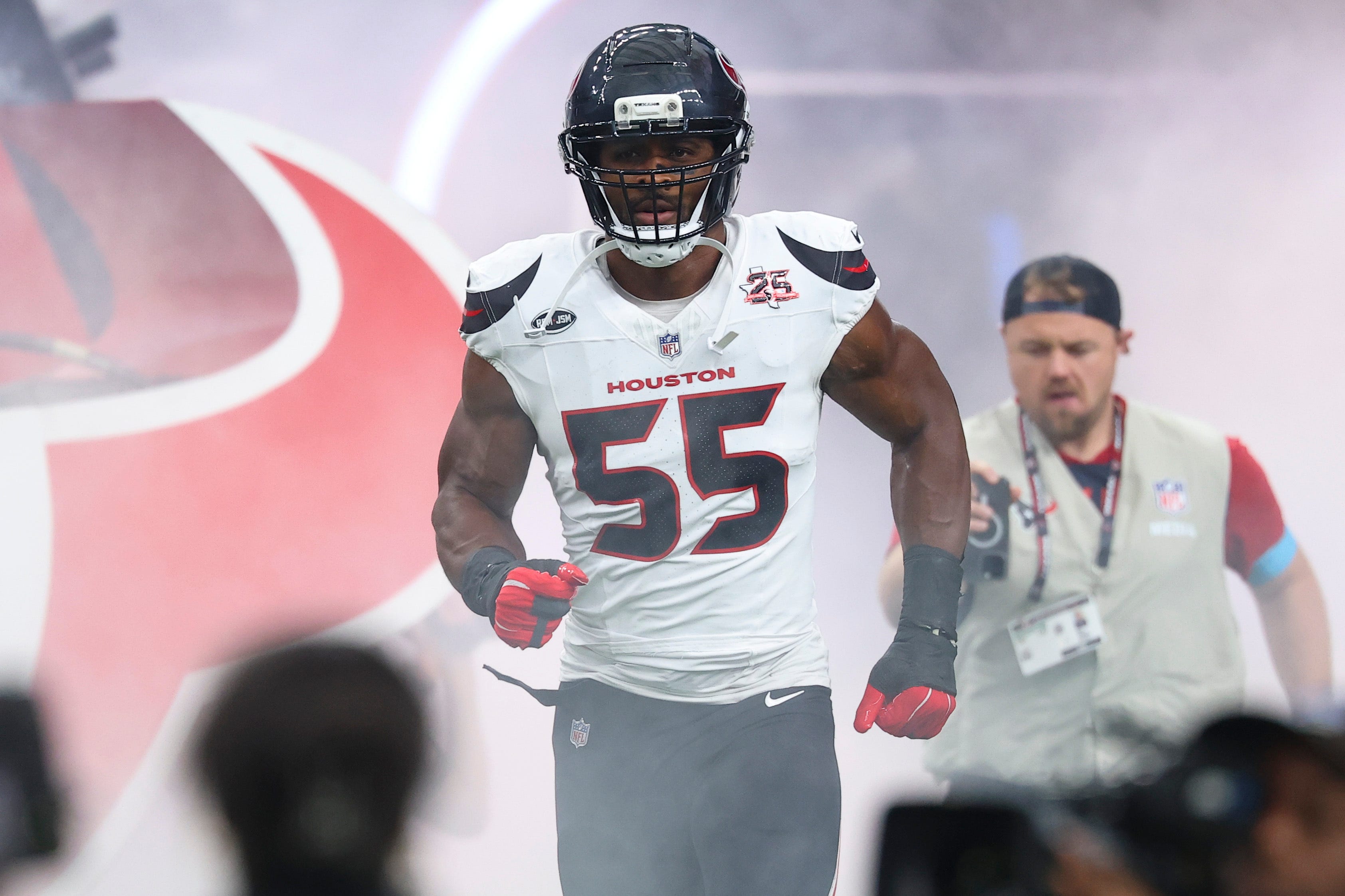 Oct 4, 2026; Houston, Texas, USA; Houston Texans defensive end Danielle Hunter (55) runs onto the field before the game against the Dallas Cowboys at Reliant Stadium. Mandatory Credit: Troy Taormina-Imagn Images