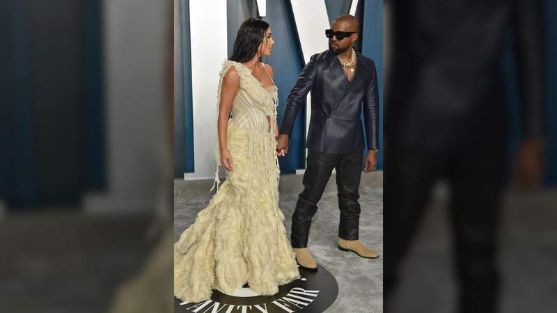 Western Reveolver Kim Kardashian’s biographer says ‘one of the policemen had a gun to Kim ...