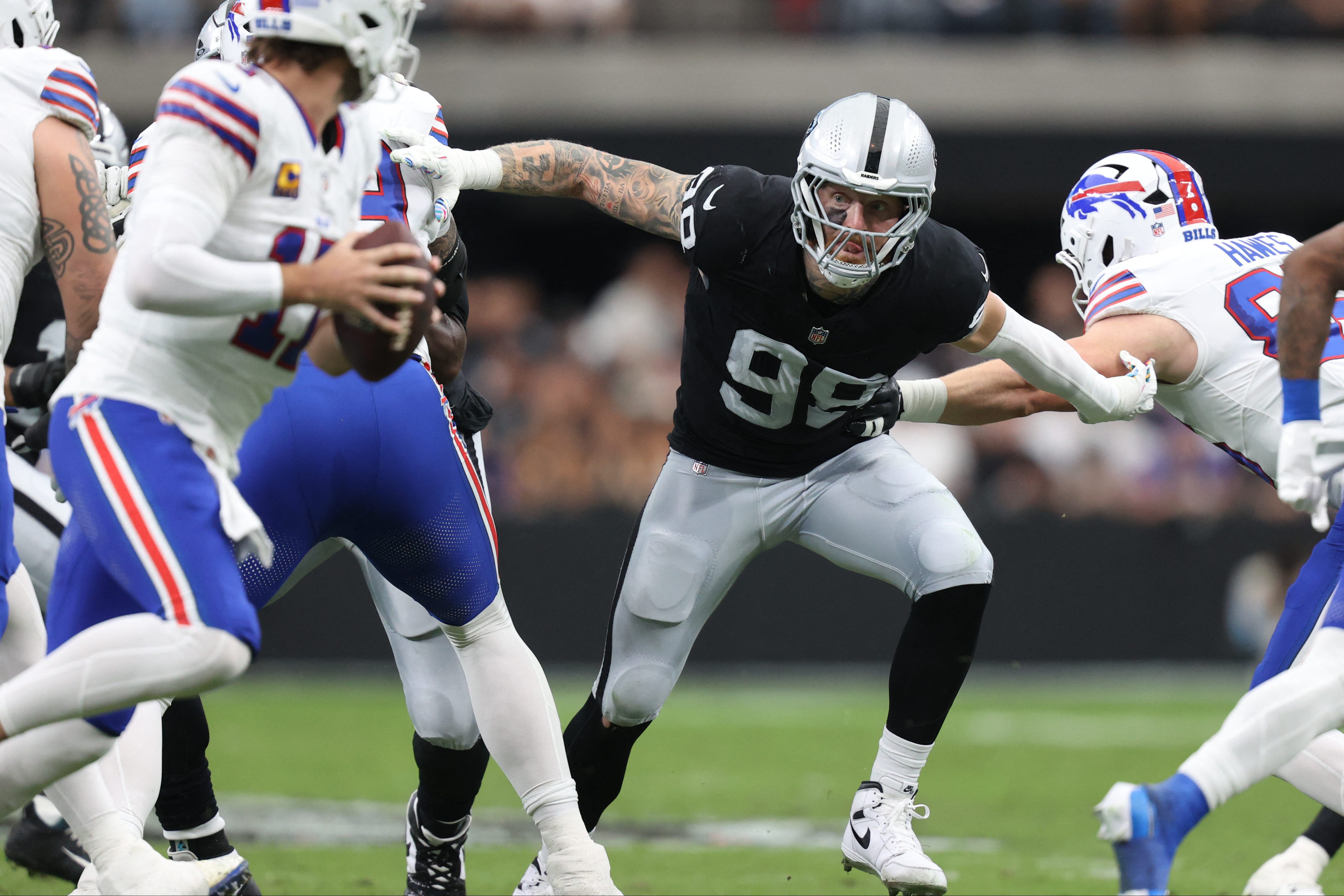 Oct 18, 2026; Paradise, Nevada, USA;  Las Vegas Raiders defensive end Maxx Crosby (98) rushes the passer in the second quarter against the Buffalo Bills at Allegiant Stadium.  Mandatory Credit: Christopher Trim-Imagn Images