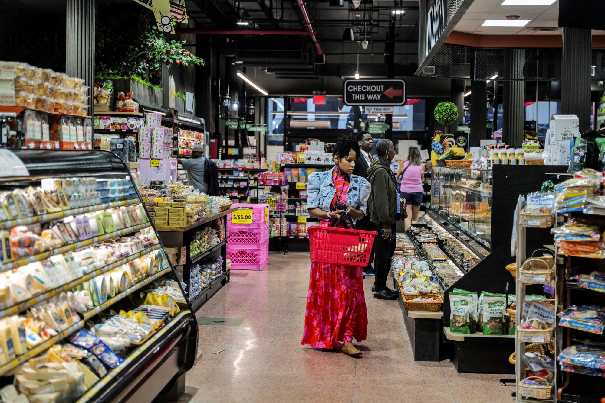 US economy grows faster than expected but inflation rises to 3.7%