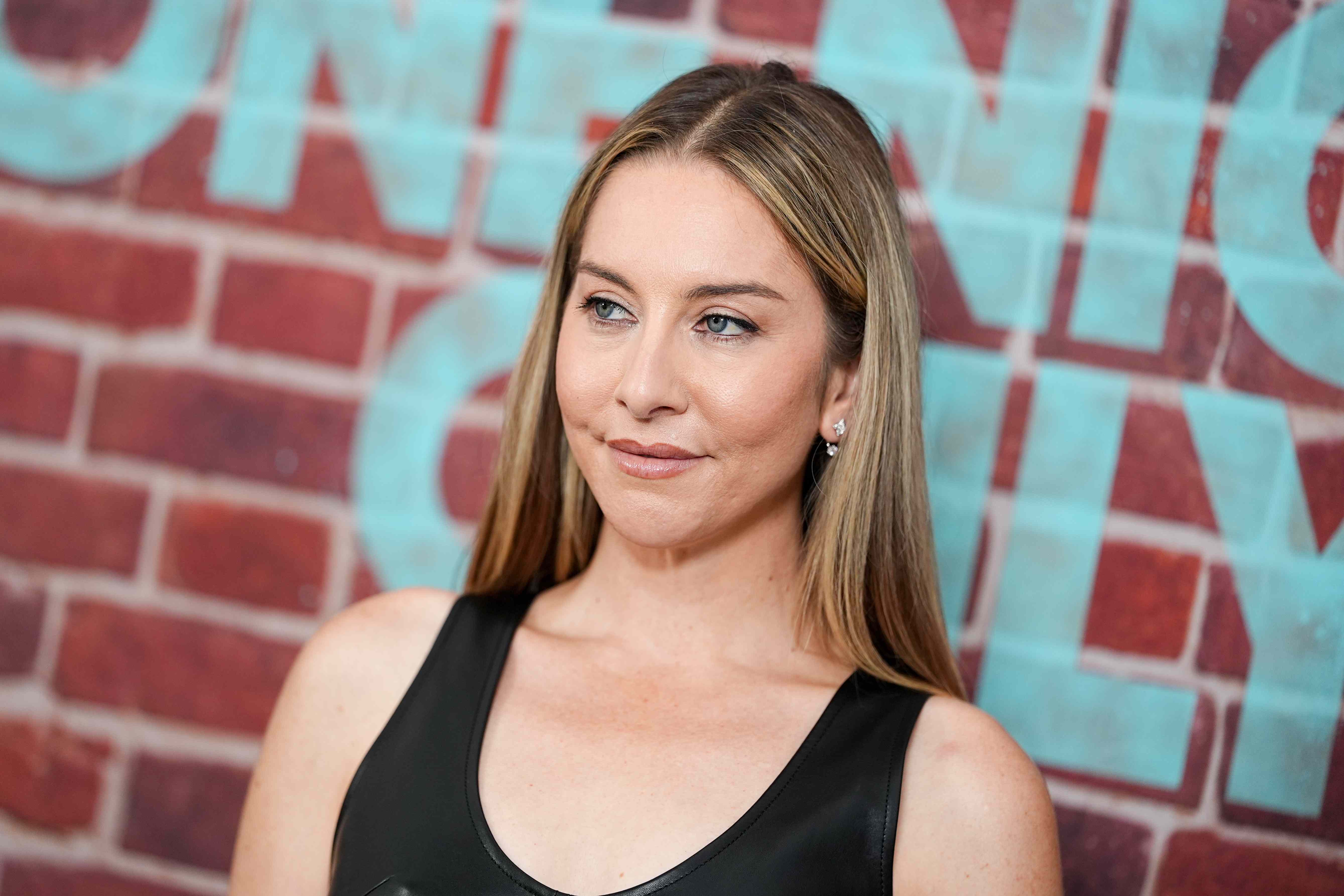 Este Haim’s Night Out Non-Negotiables Include Red Lipstick, “Blasting” Music, and Clothes That “Make You Feel Hot”