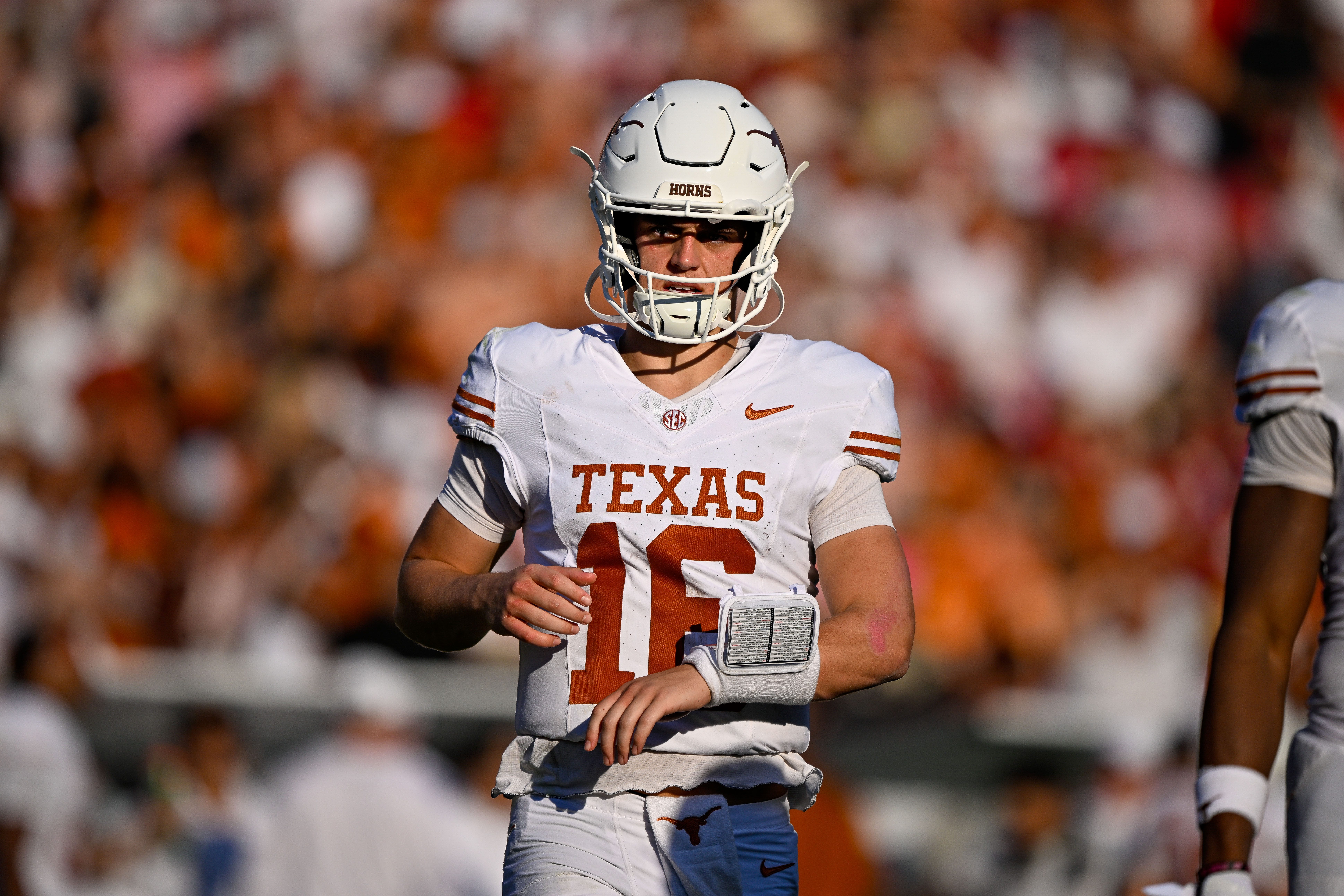 Oct 10, 2026; Dallas, Texas, USA; Texas Longhorns quarterback Arch Manning (16) runs back on the field during the game between the Sooners and the Longhorns at Cotton Bowl. Mandatory Credit: Jerome Miron-Imagn Images