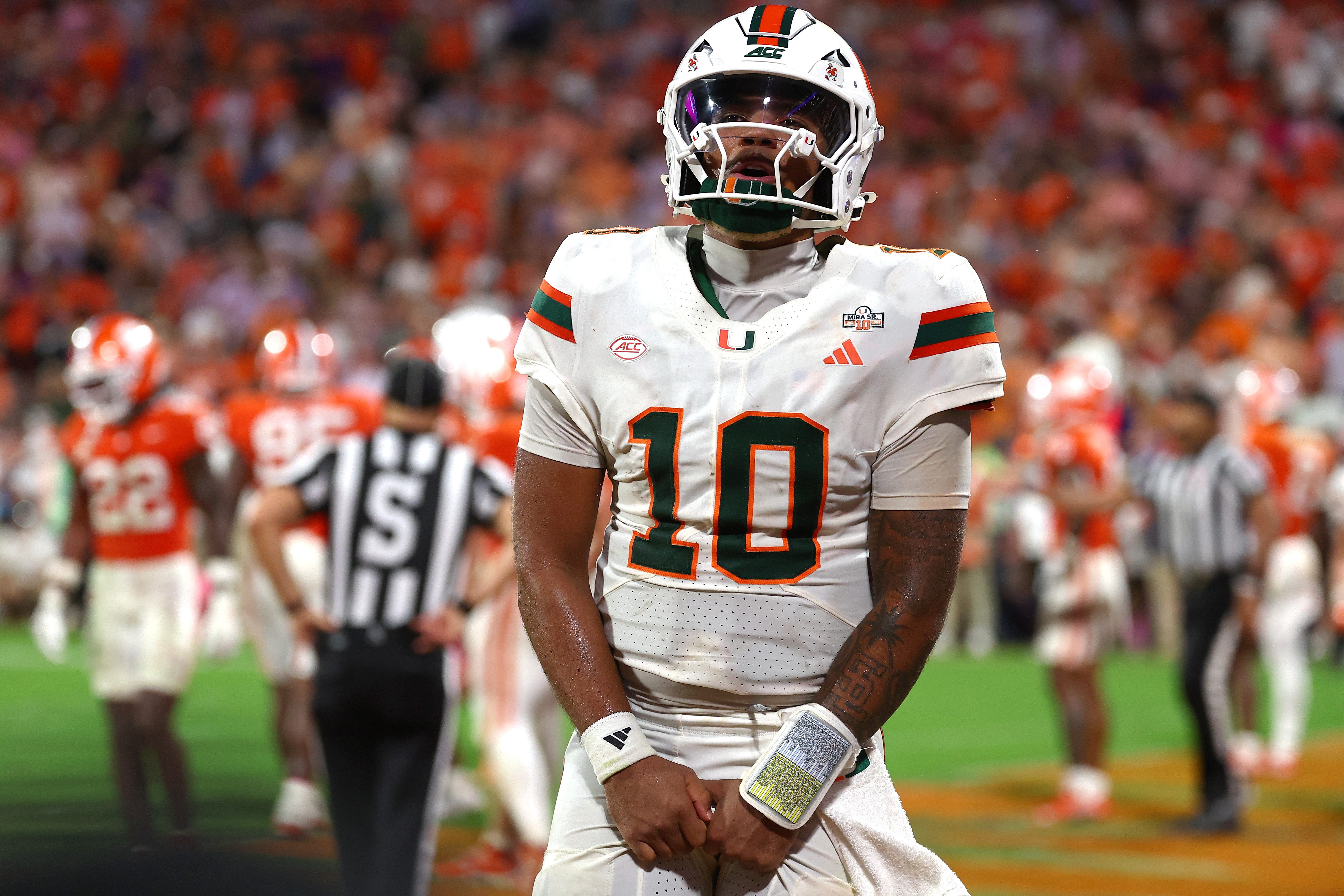 Oct 3, 2026; Clemson, South Carolina, USA;  Miami Hurricanes quarterback Darian Mensah (10) celebrates a touchdown during the third quarter against the Clemson Tigers at Memorial Stadium.  Mandatory Credit: Ashley Tumlin-Imagn Images