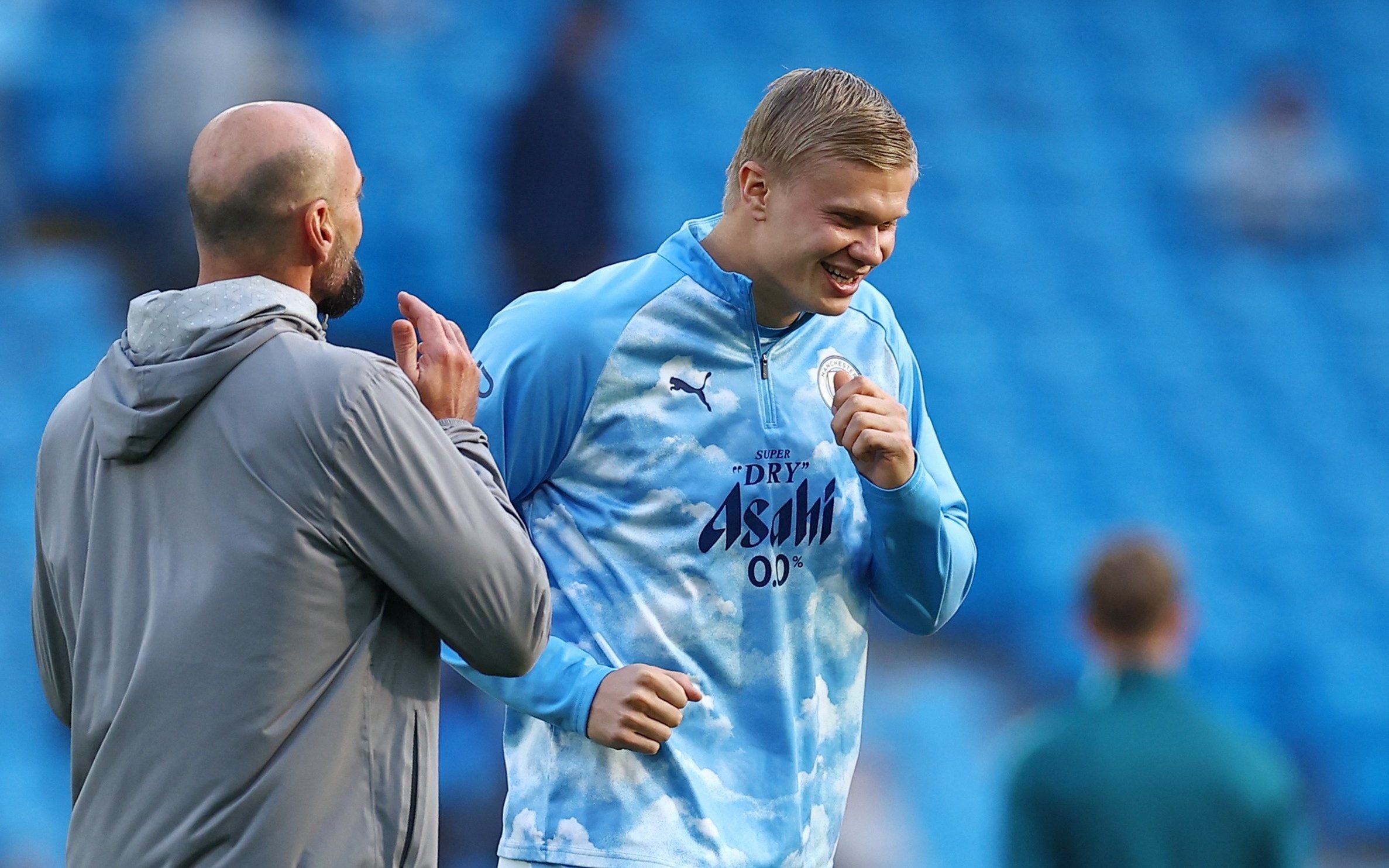 Soccer Football - Premier League - Manchester City v Brighton & Hove Albion - Etihad Stadium, Manchester, Britain - October 31, 2026 Manchester City assistant manager Willy Caballero and Erling Haaland during the warm up before the match.