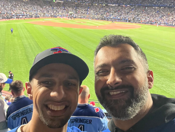 Kamran Jessani with his cousin Imran at Game 6 of the World Series (Credit: Kamran Jessani).